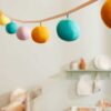 Kids Concept girlanda-pomponi